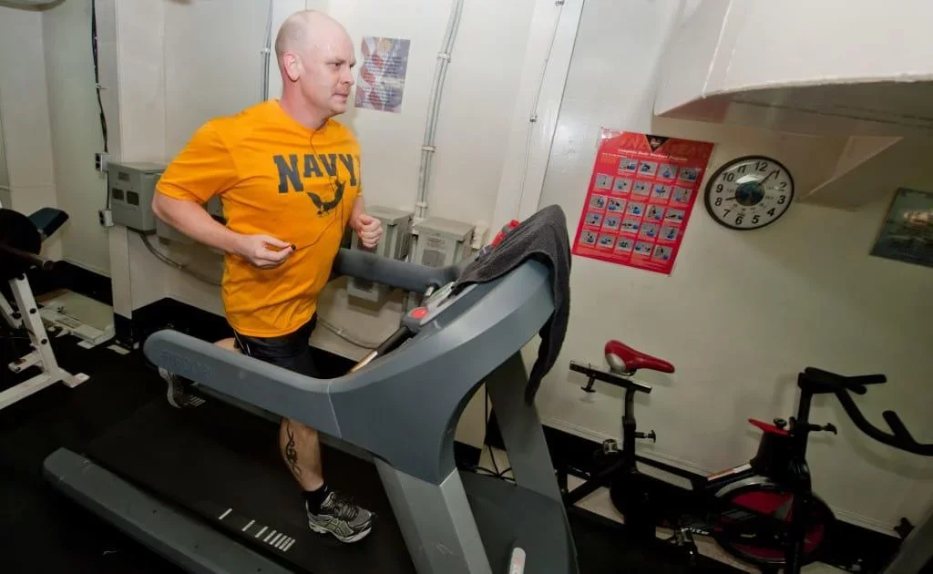 Navy running on treadmill