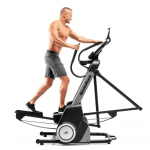 A man in athletic attire working out on the Nordictrack FS7i elliptical