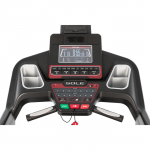 Console screen of the Sole TT8 treadmill. The features includes 2 cup holders, multiple button functions, speakers, a mini fan and a tablet holder