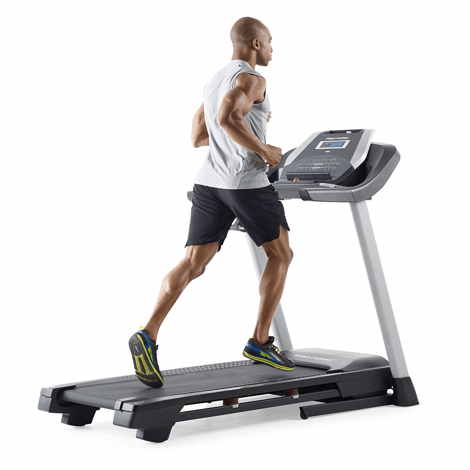 A fit man in athletic attire running on the ProForm 505 CST treadmill