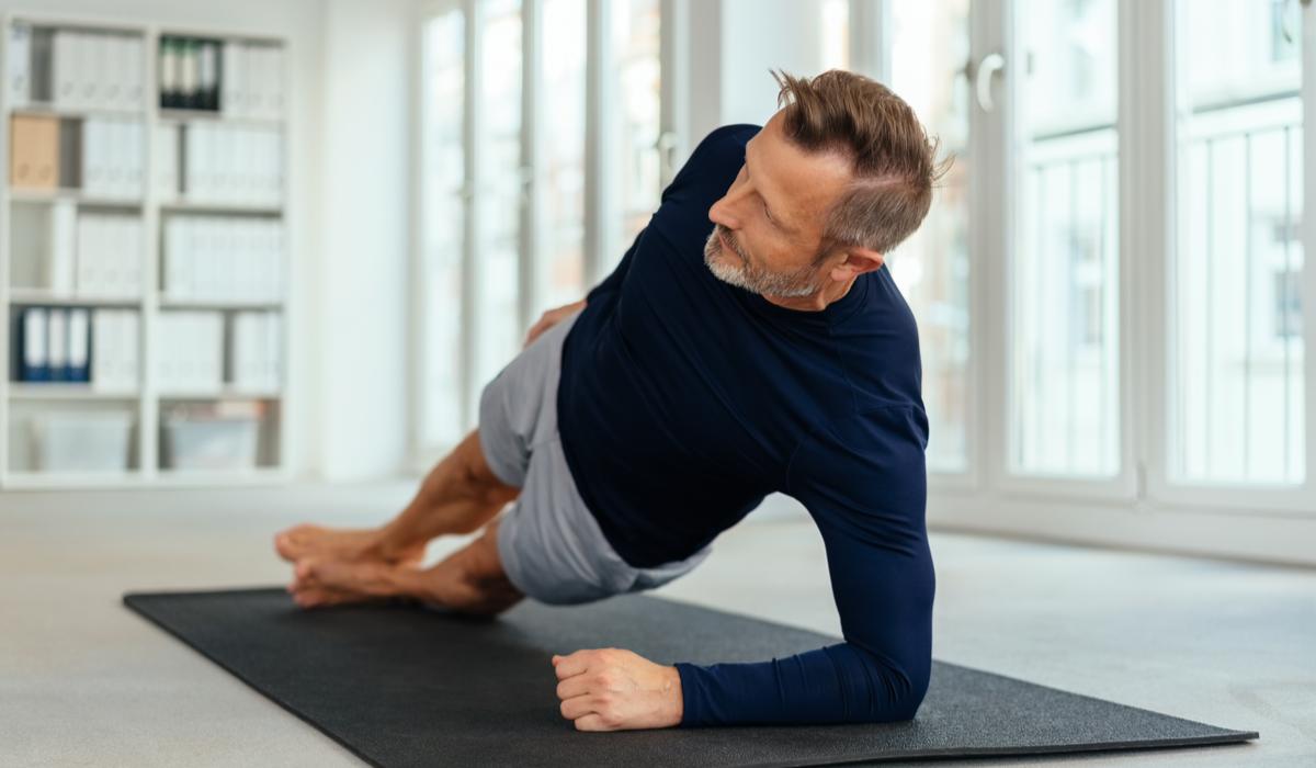 man doing a side plank