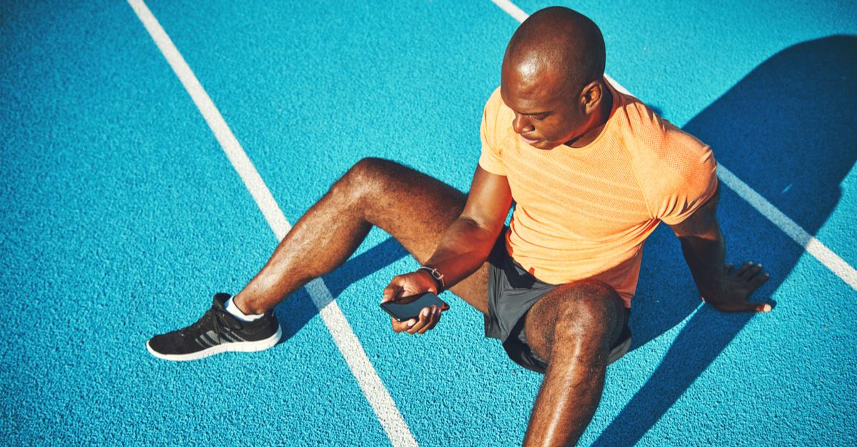 Man using phone after run