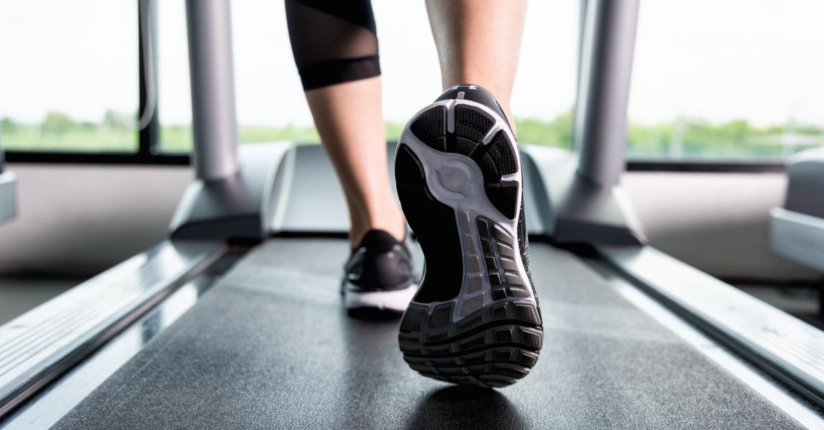 close up of legs running on treadmill