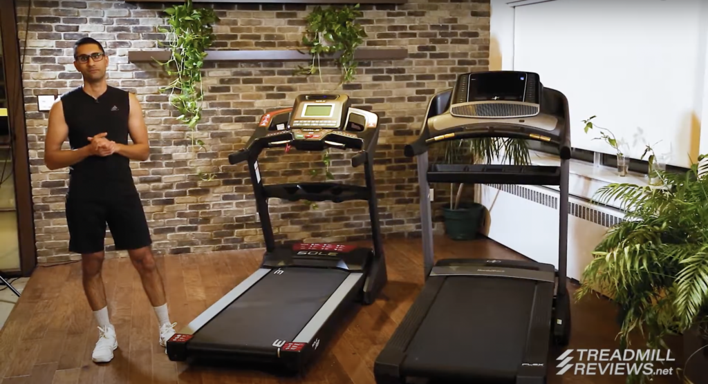 Dr. Bhasin stands beside the Sole F80 and Nordictrack 1750 treadmills.