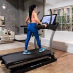 TreadmillReviews Editor Walking on NordicTrack Commercial X32i