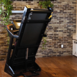 The Sole F63 treadmill folded in an upright position